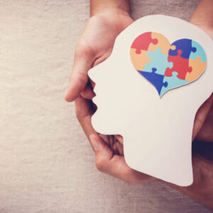 puzzle jigsaw heart on brain,  mental health concept, world autism awareness day